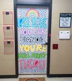 a door decorated with the words believe you can and you're brilliant