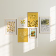 there are many cards on the wall with yellow flowers in them and one is missing