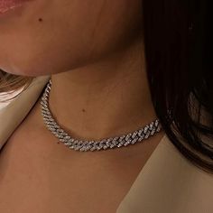 OCTOBER PROMO! A Free Heart Baguette Pendant is now included! This luxurious 8mm one-row cuban link necklace showcases sparkling VVS quality, masterfully prong set. Featuring a classic design, this gorgeous necklace makes a perfect gift for any occasion. *Diamond Tester Approved* Clarity: VVS; Color Grade: D-F; Cut: Excellent; Carat weight: Approx. 9-10 carats based on 16" length; Center Stone: VVS Lab-Grown (moissanite); Gram weight: Approx. 50 grams *Diamond Tester Approved*