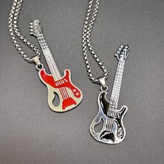 Electric Guitar Pendant And Necklace #1254 Silver With Enamel Details In Either Red Or Black A Purchaser Described It Best: "Super Cute And Sassy Without Being Overwhelming!" My Red Guitar Piece Has Become My Favorite Concert Accessory. I've Listed This As A Men's Style, But It Would Work Equally Well For Women. Note About The Material: This Piece Is Not 925 Sterling. The Manufacturer Tells Me That It Is Made Of Stainless Steel That Is Designed To Be Durable And Resist Tarnish. If You Have Any Questions, Or Would Like Additional Pictures, Just Let Me Know. Thanks For Checking Out My Poshmark Boutique! Guitar Pendant, Red Guitar, Heart Cross Necklace, Red Or Black, Punk Vintage, Mens Accessories Jewelry, Stainless Steel Rings, Stainless Steel Necklace, Black Rings