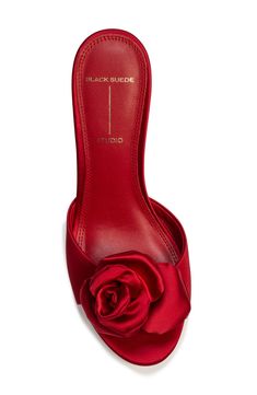 A decadently blooming rosette and sleek satin upper dial up the romance to the max setting in this date-ready sandal lifted by a slender stiletto. 2 1/2" heel Textile upper/leather lining and sole Imported Rose Heels, Red Block Heels, Red Sandals Heels, Luxury Heels, Red Sandals, Chic Me, Block Heels Sandal, Slide Sandals, Black Suede