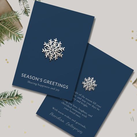 Send warm wishes to colleagues, clients, and partners with our Elegant Snowflake Season's Greetings Card. The minimalist design features a delicate snowflake on a rich navy blue background, exuding sophistication and holiday charm. Customize the back with your heartfelt message to create a memorable and professional touch for your business connections. This card is perfect for spreading holiday cheer and fostering strong relationships during the festive season. Elevate your corporate holiday gre Corporate Christmas Cards, Business Christmas Cards, Elegant Snowflake, Seasons Greetings Card, Blue Backdrop, Snowflake Cards, Season's Greetings, Snowflake Designs, Holiday Wishes