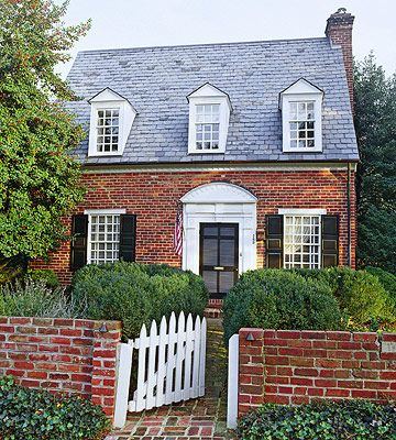 cute small brick house with white trim, black shutters and bluish roof - something appealing about this... Saltbox Colonial, Regular House, Brick Cottage, Saltbox Houses, Black Shutters, Storybook Homes, House Facade, Red Brick House, Dormer Windows