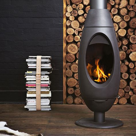 10 wood-burning stoves that will make you want to ditch your furnace Curved Fireplace, How To Clean Burners, Modern Wood Burning Stoves, Standing Fireplace, Stoves For Sale, Wood Heater, Freestanding Fireplace, Wood Fireplace, Stove Fireplace