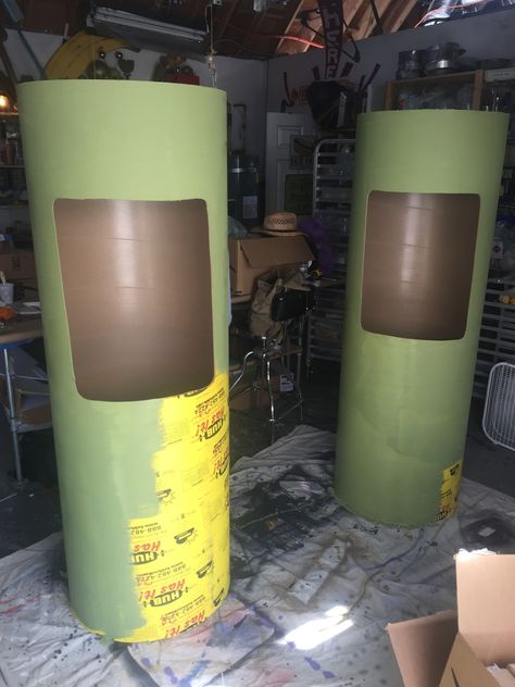 Here's how the Alien containment canisters are coming together so far.   We started with 2' wide concrete form tubes at 6' tall. Next a wind... Diy Alien Prop, Alien Themed Decorations, Alien Invasion Decorations, Alien Halloween Yard Decorations, Mars Attacks Halloween Decorations, Alien Halloween Decorations Diy, Alien Halloween Party Ideas, Alien Yard Decorations, Alien Invasion Halloween