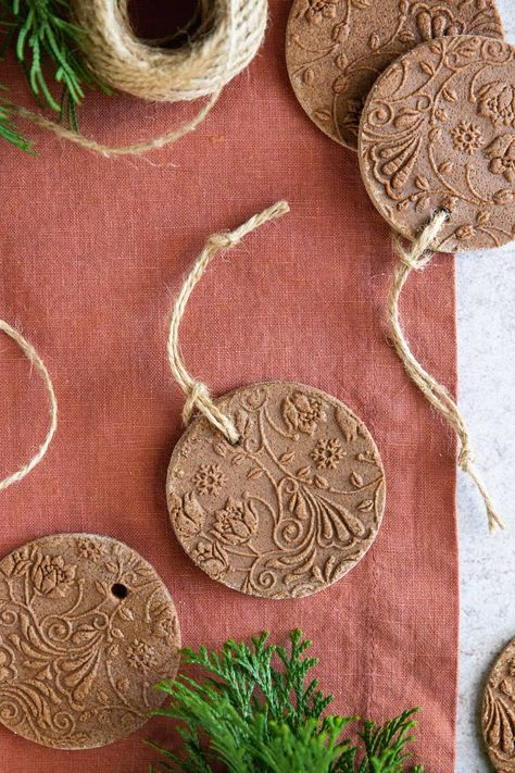 How to make homemade cinnamon ornaments Cinnamon Salt Dough Handprint Ornaments, Stenciled Wood Ornaments, Christmas Ornaments Made From Flour, Brown Christmas Ornaments Diy, Organic Christmas Ornaments, Homemade Ornament Gifts, Cinnamon Scented Ornaments, Ornaments With Cinnamon Sticks, Cinnamon Stick Nativity