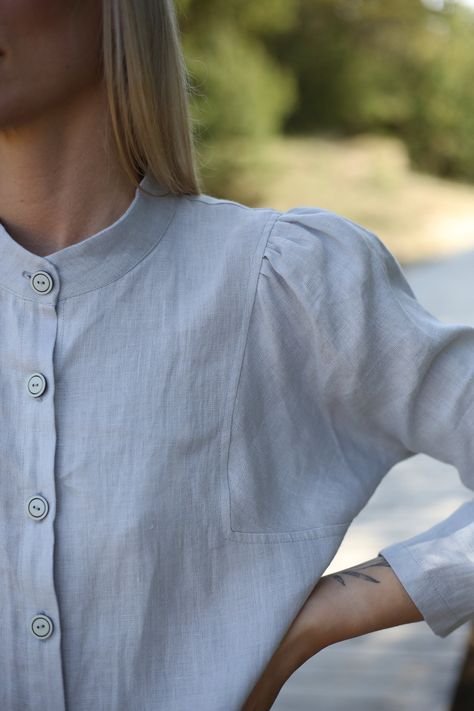 "Dress with puffed sleeves. Linen shirt dress. With buttons and pockets on the front. The model wearing size S, 172 cm/5'7\" tall. COLOR: Light gray 100% Lithuanian linen, one of the finest in Europe GARMENTS ARE DESIGNED FOR 164-176 CM HEIGHT ( 5'5\"-5'9\") PLEASE LEAVE A NOTE WITH YOUR ORDER, IF YOUR HEIGHT DOES NOT FALL IN THIS RANGE. SIZE GUIDE Body measurements: in cm / inch: XXS bust: 79-82 cm (30-32\") waist: 62-64 cm (24\"-25\") hips: 84-88 cm (33\"-34\") XS bust: 84-88 cm (33\"-34\") wa Fitted Linen Blouse With Button Cuffs, Linen Daywear Dress With Button Cuffs, Daywear Linen Dress With Button Closure, Fitted Linen Dress With Button Closure For Daywear, Fitted Linen Dress With Long Sleeves And Buttons, Shirt Pocket Designs, Linen Dresses Elegant, Linen Garments, Linen Summer Outfits