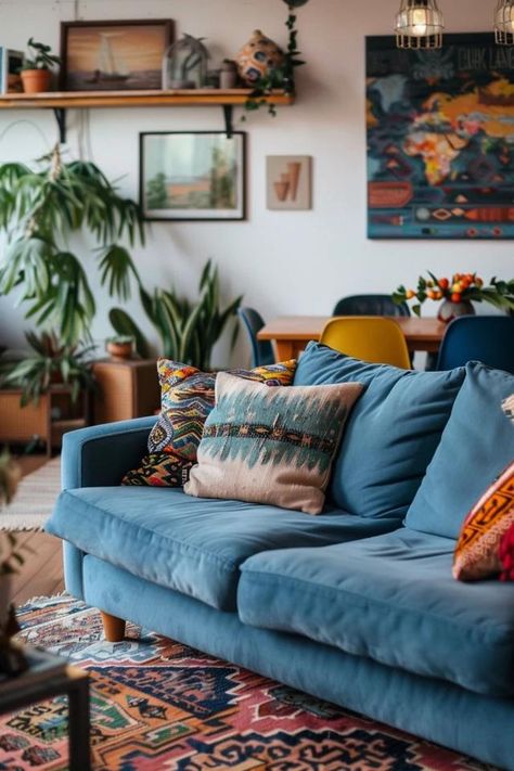 Bohemian Couch - Embrace Eclectic Home Comfort! Living Room With Turquoise Couch, Boho Blue Couch Living Room, Blue Sofa Lounge, Turquoise Couch Decor, Coloured Couch Living Room, Living Room Inspo Blue Couch, Light Blue Velvet Sofa Living Room, Blue Couch Apartment, Navy Leather Couch Living Rooms