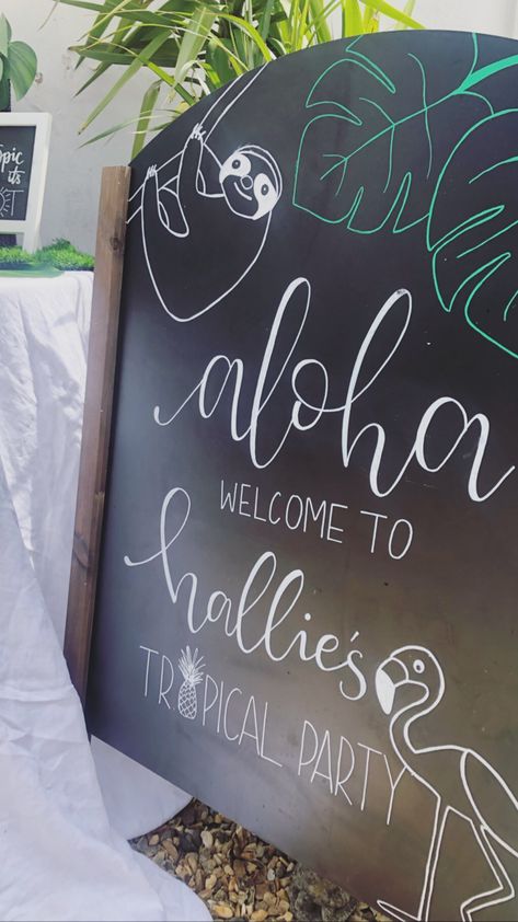 Tropical welcome sign. Aloha. Designed and hand written by All Han made Aloha Welcome Sign, Luau Welcome Sign Diy, Tropical Signs Ideas, Moana Chalkboard Sign, Luau Welcome Sign, Hawaiian Signs Diy, Aloha Chalkboard Art, Luau Chalkboard Signs, Hawaiian Chalkboard Ideas