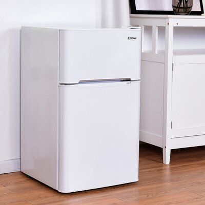 This refrigerator will keep your food, drinks fresh and chilled. Equipped with a thermostat and cooling compressor, the mini-refrigerator has a total capacity of 3.2 cubic feet. A roomy inside features a freezer compartment and two slide-out glass shelves, along with bottle storage and a can dispenser built into the interior of the door. It offers ample storage space. Color: White | FORCLOVER 3.2 Cubic Feet cu. ft. Freestanding Mini Fridge w/ Freezer Stainless Steel in White, Size 34.0 H x 17.5 Mini Fridge In Bedroom, Mini Fridge With Freezer, Can Dispenser, Mini Refrigerator, Kitchen Appliances Refrigerators, White Runway, Stainless Steel Refrigerator, Mini Fridges, Fruit Food