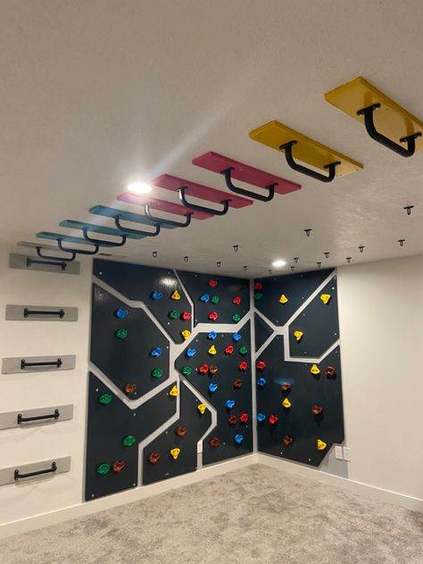 Basement Rock Wall Indoor Climbing, Indoor Rock Climbing Playroom, Basement Playground Diy, Basement Climbing Gym For Kids, Basement Climbing Wall, Basement Climbing Wall For Kids, Garage Gymnastics Gym, Sensory Seeking Playroom, Basement Rock Climbing Wall