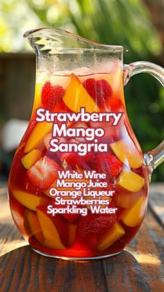 Summer calls for refreshing drinks, and nothing says refreshment quite like a chilled glass of Strawberry Mango Sangria. This blend is a favorite because it mixes sweet strawberries and luscious mango with a crisp white wine, infused with a hint of citrus from limes and lemon. #strawberrymangosangria Mango Sangria Recipes, Drinks With Wine, Summer Alcoholic Drinks, Adult Summer Party, Mango Sangria, Summer Drinks Alcohol Recipes, Homemade Sangria, Summer Drinks Alcohol, Cocktail Drinks Alcoholic