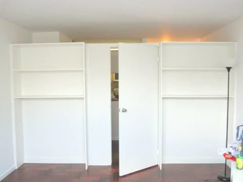 For years, renters have used temporary walls to subdivide apartments into affordable slices for roommates. But due to a fire-safety-related crackdown by the city, many management companies and landlords no longer permit walls that reach the ceiling. Enter the bookshelf wall, like those pictured above. They don't reach the ceiling--typically topping out about a foot below--so they are technically considered furniture. Temporary Walls, Divider Bookcase, Room Divider Headboard, Room Divider Decor, Kids Room Bookshelves, Temporary Room Dividers, Small Room Divider, Closet Ikea, Metal Room Divider