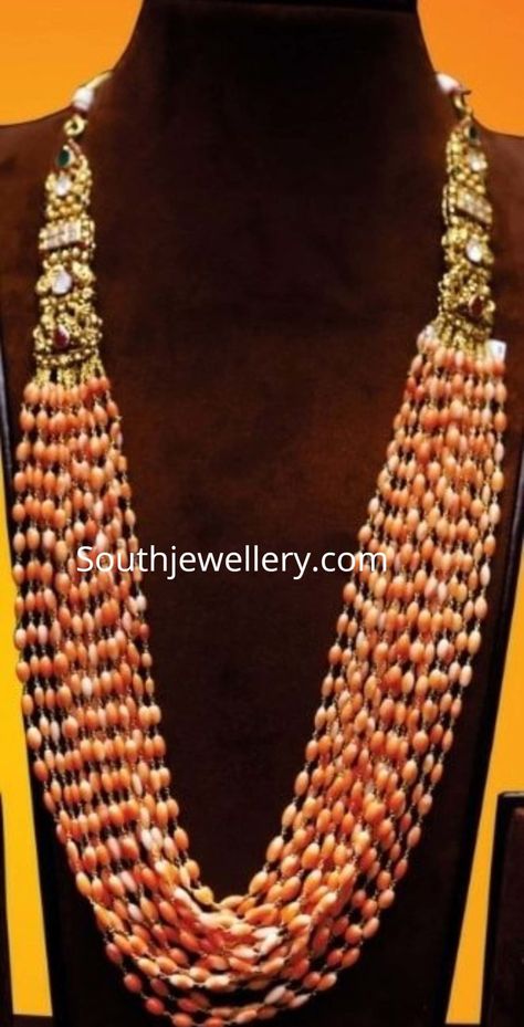 Multi strand coral beads long necklace photo Coral Beads Jewellery Indian, Corals And Pearls Jewellery, Corals Jewellery, Coral Beads Jewellery, Pagadala Mala, Coral Jewelry Necklace, Groom Jewellery, Coral Jewelry Vintage, Amrapali Jewellery