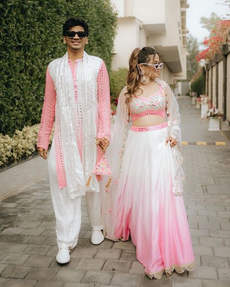 Bride @iamshriyajain & Groom @rishavjain1704 taking color coordination to pink level. Bride's Outfit : @rajbinderchahalofficial Groom's outfit : @elitebypriya #bridallehenga #indianbride #bridesof2024 #lehengagoals #celebritywedding #bollywood #bollywoodstyle #bollywoodwedding #wishnwed #anantradhika #anantradhikawedding #anantradhikaprewedding #viral #trending #bollywoodbride #bollywoodshaadi #reels #trendingreels #instatrending #pinklehenga #coordinated couple #bridallehenga #scallop... Pithi Outfit Brides, Haldi Dress For Bride Indian, Blouse Designs Indian Bridal, Haldi Ceremony Outfit For Bride Unique, Bridal Lehenga Latest, Bridal Lehenga Blouse Designs, Haldi Ceremony Outfit For Bride, Haldi Outfits For Bride, Bridal Look Indian