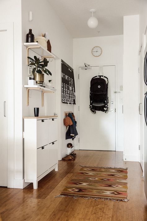 A 600-Square-Foot Vancouver Family Home. Like the shelves and brackets and use of IKEA spice racks. Small Entryways, Hallway 2023, Ideas For Small Apartments, Små Rum Lidt Plads, Vstupná Hala, Hemma Diy, Decor Ikea, Diy Casa, Entryway Ideas