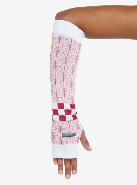 Keep yourself warm while you train! These Demon Slayer: Kimetsu no Yaiba arm warmers have a pink design knit throughout inspired by Nezuko's kimono  plus a patch up top inspired by her bamboo gag. Demon Slayer Stuff, Umpa Lumpa, Design Knit, Hello Kitty Crochet, Mohawks, Straykids Hyunjin Photoshoot, Anime Clothes, Demon Slayer Kimetsu No Yaiba, Tomboy Style Outfits