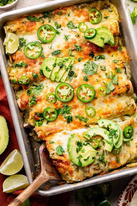 Load up on these Easy Green Chicken Enchiladas for a satisfying and protein-loaded meal. Made with salsa verde and Greek yogurt, these enchiladas put a healthy twist on the dish! Greek Yogurt Chicken Enchiladas, Greek Yogurt Enchiladas, Easy Salsa Verde Chicken Enchiladas, Green Chilli Chicken Enchiladas, Chicken Enchiladas Green Sauce, Rotisserie Chicken Enchiladas, Salsa Verde Chicken Enchiladas, Chicken Enchiladas Verde, Green Chili Chicken Enchiladas