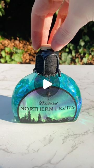 Forbidden Forest Apothecary on Instagram: "Northern Lights ✨🩵✨🩵✨🩵✨🩵✨ Magical, decorative, color changing potion bottles available in my shop!  #potion #potions #fantasy #art #magic #smallbusiness #smallbusinessowner #bookshelfdecor #potionbottle" Color Changing Potion Diy, Forest Apothecary, Moon Potion, Diy Potions, Color Changing Potion, Magic Potion Bottles, Crow Moon, Bottle Decorations, Forbidden Forest