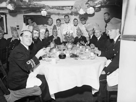 Christmas dinner and celebrations in the wardroom of HMS MALAYA. The ship is based at Scapa Flow.  Label Christmas dinner in the wardroom of... Scapa Flow, Military Christmas, Australian Navy, Royal Australian Navy, Christmas Soldiers, 25th December, Canada Food, Ww2 History, Trying To Survive