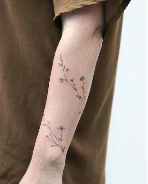 Wrapping wildflower vine  🌿#wildflowers #fineline Tattoo Over Scarring, Fine Line Flower Vine Tattoo, Flowers Around Arm Tattoo, Fine Line Vine Arm Tattoo, Tattoo On Scar, Vine Forearm Tattoo, Sleeve Floral Tattoo, Buraka Tattoo, Line Floral Tattoo