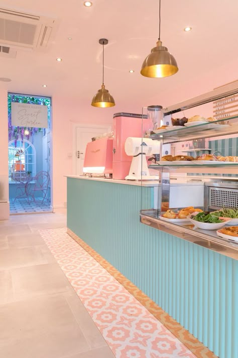 Blue Coffee Bar, Cake Shop Design, Colorful Cafe, Pink Painted Walls, Cosy Cafe, Cafe Counter, Smoothie Shop, Pink Cafe, Bakery Design Interior