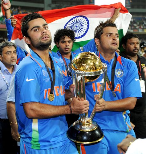 They were the future then and are not firmly, the present. Virat Kohli and Suresh Raina hold the cup in their hands and what a moment for them it was - a proud victory in their very first World Cup tournament.<br><br>They were brave, agile, aggressive and aware - aware that the onus of the future World Cups lies on them. 2011 Cricket World Cup, Suresh Raina, History Of Cricket, History Wallpaper, Indian Team, Hd Wallpapers For Laptop, World Cup Trophy, First World Cup, India Cricket Team