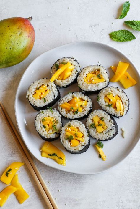 Dessert sushi twist on mango sticky rice! Nori sushi wraps stuffed with sweet coconut rice and fresh sliced mango. Serve with optional date syrup! Sushi Wraps, Sticky Rice Dessert, Mango Sushi, Tahini Date, Nori Sushi, Sushi Wrap, Nori Wrap, Sushi Recipes Homemade, Dessert Sushi