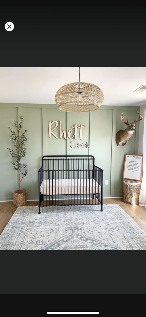 Nursery Green Accent Wall Black Crib, Black Brown Green Nursery, Boho Nursery Black Crib, Sage Green Nursery Black Crib, Black And Oak Nursery, Rustic Modern Nursery, Dark Crib Nursery, Southern Baby Boy Nursery, Black Furniture Nursery