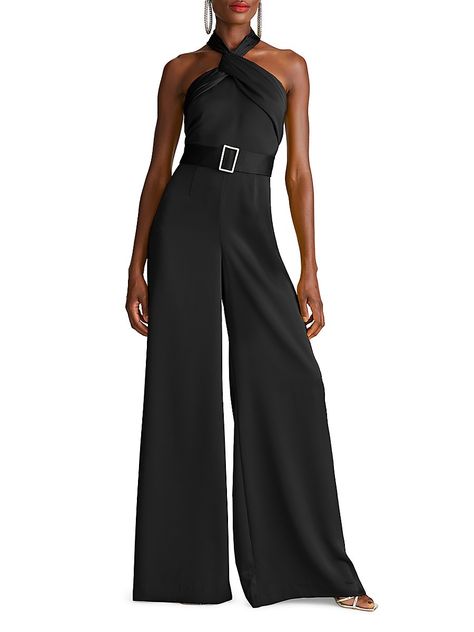 "Find HALSTON Kani Satin Halter Jumpsuit on Editorialist. Halston's Kani sleeveless wide-leg jumpsuit features a twist at the halter neckline and a sleek satin finish. Halterneck Sleeveless Self-belt Back zip closure 100% polyester Dry clean Imported SIZE & FIT About 63.75\" from shoulder to hem Model measurements: 5'10\" tall Model is wearing a US size 4. Halston. Color: Black. Size: 2." Black Halter Jumpsuit, Halter Neck Jumpsuit, Crepe Jumpsuit, Satin Jumpsuit, Halter Jumpsuit, Black Halter, Norma Kamali, Halter Neckline, Wide Leg Jumpsuit