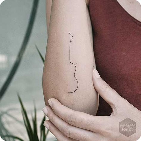 Simplistic Guitar Tattoo, Musical Tattoos For Guys, Guitar Symbol, Guitar Tattoo Ideas, Music Tattoo Ideas, Small Music Tattoos, Piano Tattoo, Acoustic Guitar Tattoo, Guitar Tattoo Design