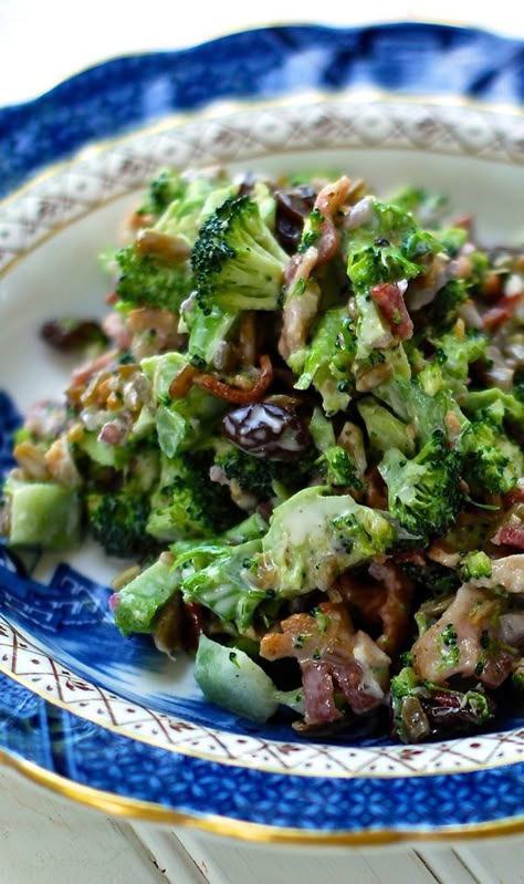 Mom always made a broccoli salad with head of broccoli, 6 strips bacon, 1/2 cup onion, 1/2 cup raisins, 1 cup mayo, 2 Tbls sugar, 1-2 Tbls of vinegar. Link goes to a similar recipe.  I like the addition of 1 cup sunflower seeds, more raisins, and using honey instead of white sugar. Broccoli Salad, Health Guide, Picnic Foods, Salad Bar, Salad Dressings, Better Health, Sunflower Seeds, Delicious Salads, Recipe Collection