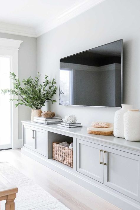 Tv Storage Bench, Mounted Tv With Storage, Mounted Tv In Living Room, Furniture For Tv Wall, Tv Cabinetry Built In, White Shiplap Tv Wall, Modern Farmhouse Tv Cabinet, Tv Wall With Cabinets Underneath, Tv On Big Wall Ideas