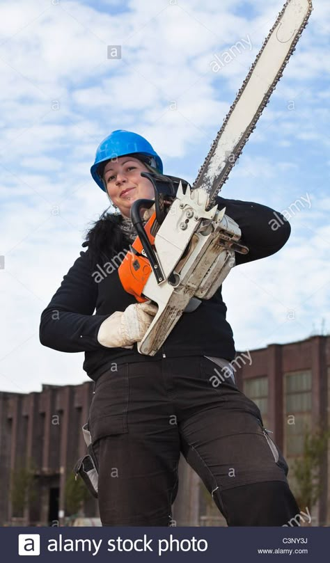 Download this stock image: Female worker in workwear and hardhat holds large chainsaw - C3NY3J from Alamy's library of millions of high resolution stock photos, illustrations and vectors. Chainsaw Drawing, Stock Photos People, Dollar Photo, Photo Club, Human Reference, Body Reference Poses, Character Poses, Dynamic Poses, Figure Drawing Reference