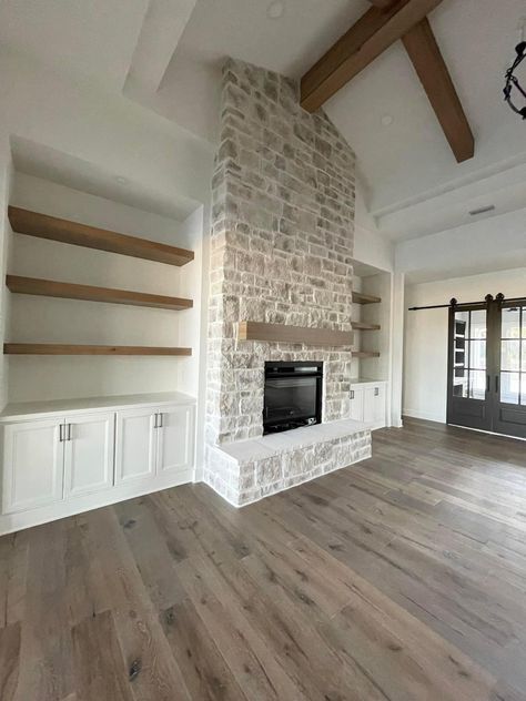 Farmhouse Stone Fireplace Ideas, Living Room Fireplace Brick, Fireplace With Carpet Floor, Doors Next To Fireplace, Stone Chimney Makeover, Shelves By Fireplace Built In, El Dorado Stone Fireplace, Modern Farmhouse Fireplace Stone, Farmhouse Modern Fireplace