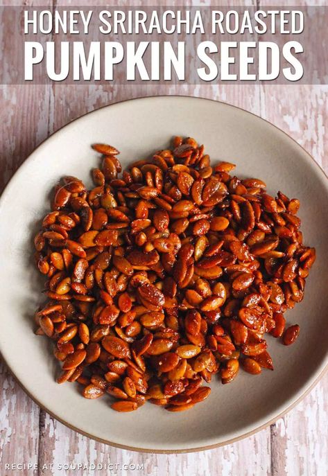 Sweet and spicy and completely irresistible, honey sriracha roasted pumpkin seeds are an addictive - but completely healthy - snack you can feel good about making at home. Recipe at SoupAddict.com #pumpkinseeds #srirachapumpkinseeds #roastedseeds Savory Pumpkin Seeds, Pumpkin Roasted, Spicy Pumpkin Seeds, Pumpkin Seeds Baked, Roasted Seeds, Sweet Pumpkin Seeds, Sriracha Recipes, Pumpkin Seed Recipes, Toasted Pumpkin Seeds