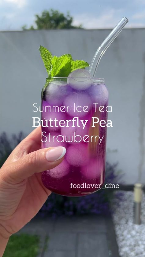 Summer Ice tea l Butterfly 🦋 Pea Tea Strawberry 🇺🇸 recipe in the c... | Ice Tea | TikTok Drink Essentials, Summer Iced Tea, Strawberry Recipe, Butterfly Pea Tea, Butterfly Tea, Iced Tea Recipes, Summer Drink Recipes, Strawberry Syrup, Infused Water Bottle