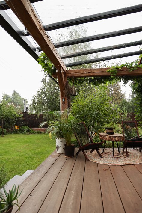 Wooden terrace in summer. A perfect northern terrace, but this year we needed additional sun protection. The terrace is made of larch boards, the poles are made of very old wood. The roof is glass. I love relaxing there, reading books, meeting friends and practicing yoga. Laundry dries well on it as well :) Wooden Pergola With Glass Roof, Wooden Terrace Roof, Terrace Glass Roof, Wooden Terrace Ideas, Open Terrace Ideas, Cottage Terrace, Glass Terrace, Terrace Cover, Wood Terrace