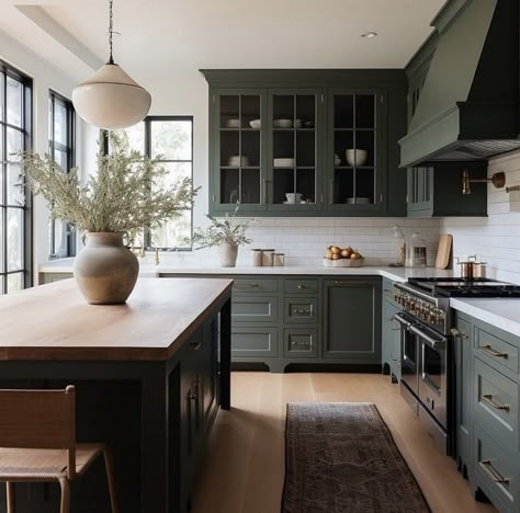 Colonial Townhouse Interior Design, Colonial Modern Kitchen, Kitchens With Black Islands, Earthy Green Kitchen Cabinets, Two Tone Blue Kitchen Cabinets, Contemporary Country Kitchen, Green Black And White Kitchen, Kitchen With Black Windows, Earthy Tone Kitchen