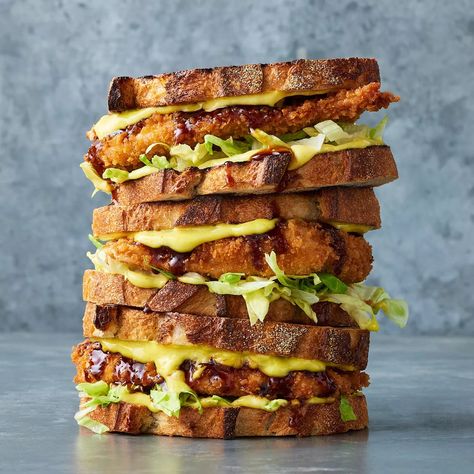 Inspired by the moreish flavours of Japanese chicken katsu, this sandwich is full of crunch. It's topped with iceberg lettuce, mayonnaise and tonkatsu sauce for the ultimate bite. Sourdough Chicken, Japanese Chicken Katsu, Asian Pork Meatballs, Japanese Sandwich, Egg Mayonnaise, Tonkatsu Sauce, Japanese Chicken, Chicken Katsu, Asian Pork