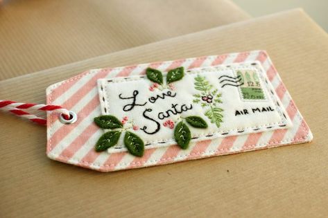 handmade embroidered "Love Santa" tag by nanaCompany, T_2884 Santa Tag, Rug Patterns, Penny Rug, Holiday Tags, Merry Christmas To You, Diy Tags, Christmas Sewing, Noel Christmas, Christmas Embroidery