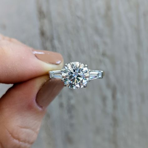 Baguette, Circle Center Stone Engagement Ring, Round Diamond Side Stones, Round Diamond Engagement Rings With Baguettes, Round Ring With Baguettes, Round Center Stone Engagement Ring, Round Tapered Baguette Engagement Ring, Best Engagement Ring For Chubby Hands, Round Diamond Ring With Baguettes