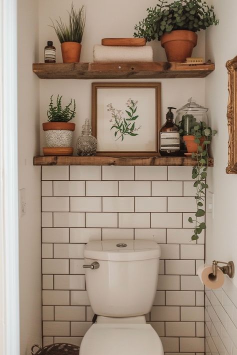 Get extra storage in your bathroom with these tips to help you choose new floating shelves. Toilet Inspo Bathroom Ideas, Bathroom Shelf Idea, Above Toilet Decor Ideas, Behind The Toilet Decor, Diy Bathroom Shelving, Shelving In Bathroom, Floating Shelves In Bathroom, Floating Shelves Above Toilet, Bathroom Shelves Decor