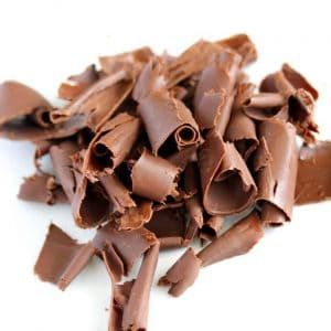 How to Make Chocolate Curls - Spend With Pennies Happy Chocolate Day, Chocolate Garnishes, Honey Chocolate, Chocolate Curls, Chocolate Day, Chocolate Butter, Icebox Cake, Chocolate Decorations, Chocolate Shavings