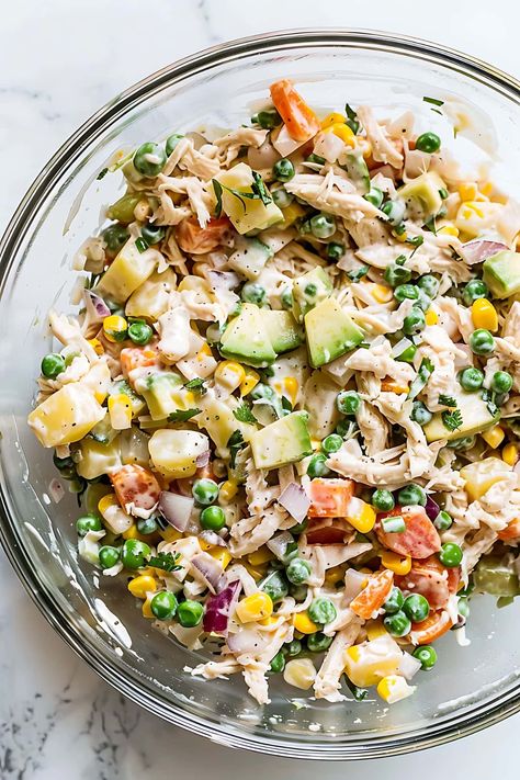 This mouthwatering Mexican chicken salad combines tender chicken with creamy avocado, a medley of colorful veggies, and zesty jalapeño-lime dressing. Fiesta Chicken Salad, Mexican Chicken Pasta Salad, Chicken And Corn Salad, Jalapeño Chicken Salad, Tex Mex Chicken Salad, Mexican Chicken Salad Recipe, Savory Chicken Salad, Spicy Chicken Salad, Mexican Chicken Salad