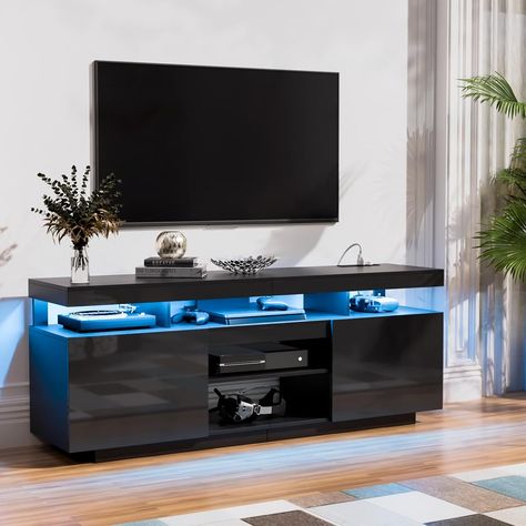 Modern & Power Outlets】TV stand is equipped with 4 standard plug outlets and a 6.5ft power cord, allowing you to conveniently charge your phone, WiFi router, iPad, and more. 【Spacious Storage Space】Offers 5 open shelves and 2 large cabinets. Store DVDs, CDs, gaming devices, books, etc. The removable middle shelf allows customization, perfect for your PS5 and gaming gear. The back wire holes also help you organize wires and cables to ensure a neat and clean line of sight. Large Cabinets, Gaming Tv, Tv Consoles, Tv Entertainment Centers, Black Tv Stand, Led Tv Stand, Modern Entertainment Center, Media Table, Black Tv