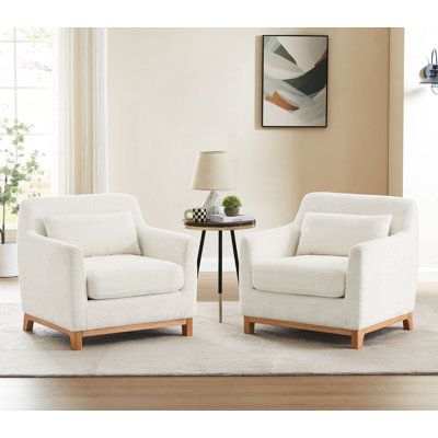 If you have the space, why limit yourself to just one accent chair? Turn your living room or guest room into another spot to chat and chill with a set of chairs and a small table. This set of barrel chairs are built by solid wood and plywood, upholstered by velvet/boucle fabric and filled with high-resistent foam to provide excellent seating experience. The solid rubber wood base is the guarantee of durabily and also add some bold and neutral hues. This set of 2 will be a surefire conversation s Two Accent Chairs And Table, Living Room Sofa And Accent Chairs, Living Room Designs Sofa 2 Chairs, Double Accent Chairs Living Room, Living Room Designs White Sofa, Family Room Chairs Ideas, Armchair Seating Area, Two Armchairs And Table, 2 Armchairs And Table