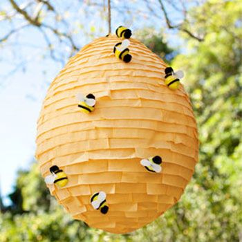 Just too precious! This bumblebee piñata is a DIY tutorial over at Country Living, with instructions for both the hive and the bees. The piñata starts with an oversized balloon, and overall it only costs $10 to make the whole project – bees and all! ... Paper Mache Pinata, Pinata Diy, Fun Summer Crafts, Bee Birthday Party, Piñata Ideas, Diy Pinata, Winnie The Pooh Birthday, Bee Party, Bee Birthday