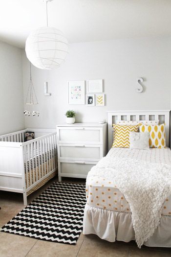 I like the ideas going on here for a room that is shared by a toddler/older child and a baby.  Will be implementing some of these ideas soon! Toddler And Baby Room, Gender Neutral Bedrooms, Sibling Room, Shared Nursery, Sister Room, Shared Kids Room, Bedroom Hacks, Baby Room Neutral, Shared Bedroom