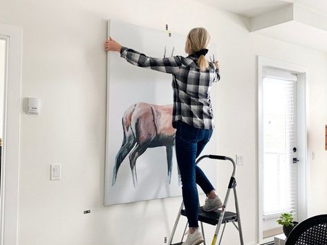 How to hang a large canvas - tools and tips | UTR Decorating How To Hang Large Canvas On Wall, How To Hang A Large Picture On The Wall, How To Hang, Hanging Canvas, Large Canvas, Off The Wall, Hanging Hardware, The Wall, Tools